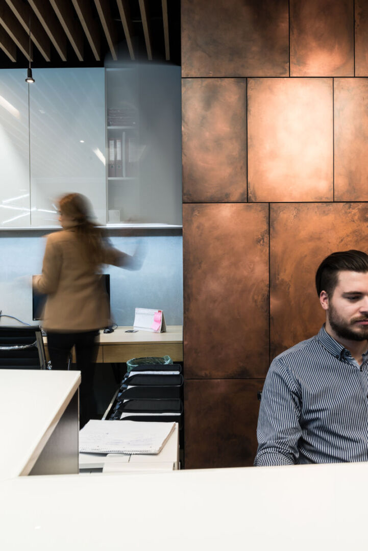 Innovative reception area featuring a polygonal desk at PERGO.