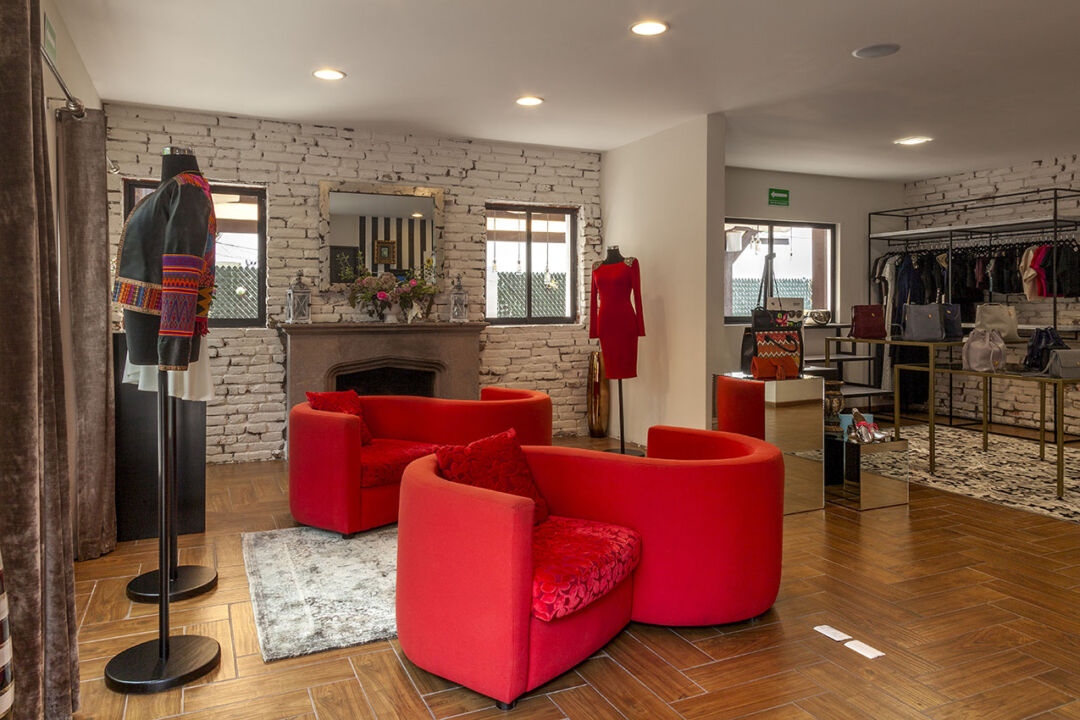 High-end fashion displayed inside the stylish boutique space. High-end fashion displayed inside the stylish boutique space.