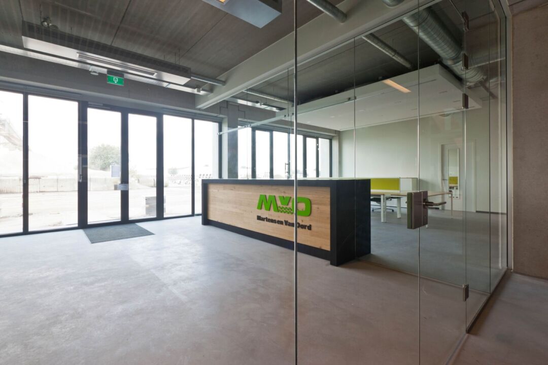Open working environment with steel, concrete, and wood elements. Open working environment with steel, concrete, and wood elements.