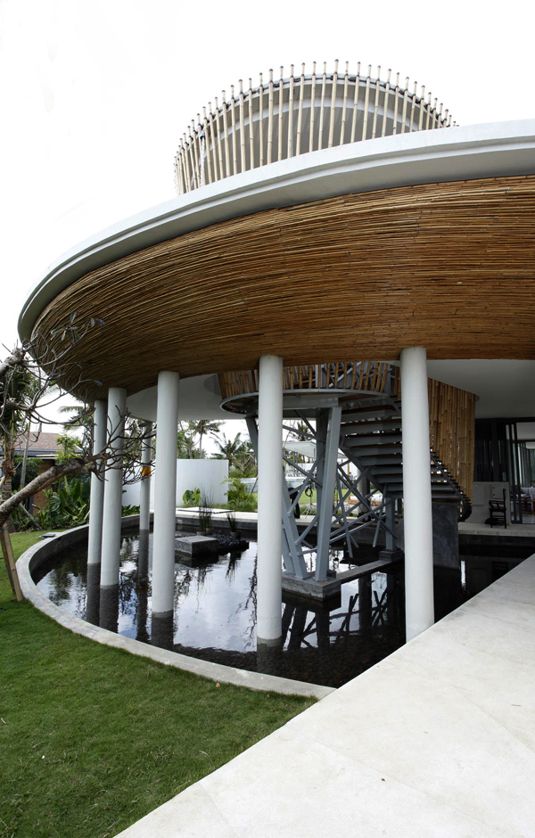 Carport integrated within a unique house layout. Carport integrated within a unique house layout.