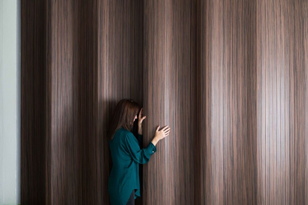 Innovative wood paneling highlights the cozy apartment.