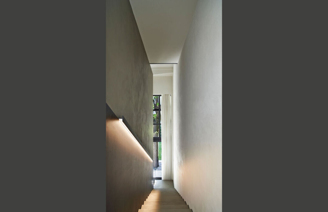 Staircase focal point highlighting unique architectural design. Staircase focal point highlighting unique architectural design.