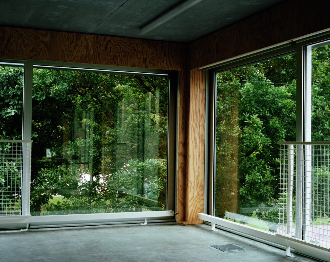 Facade showcasing concrete and aluminum materials of the center. Facade showcasing concrete and aluminum materials of the center.