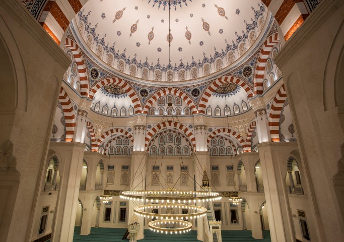 Majestic minarets reaching high against the night sky. Majestic minarets reaching high against the night sky.