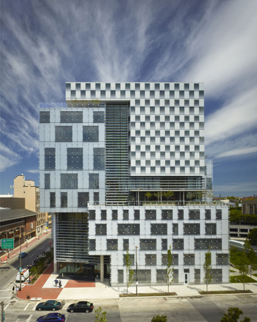 Sustainable building features striking glass and aluminum facade. Sustainable building features striking glass and aluminum facade.