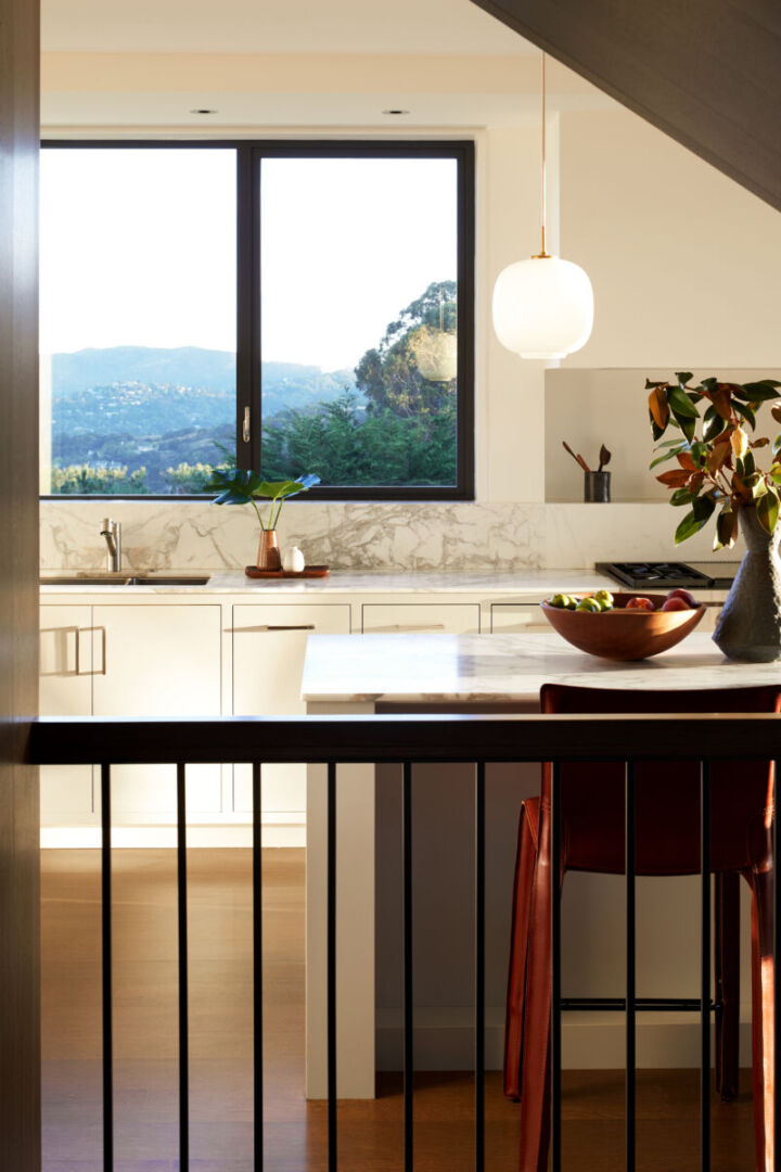 Third story with strategic setback enhances surrounding aesthetics.