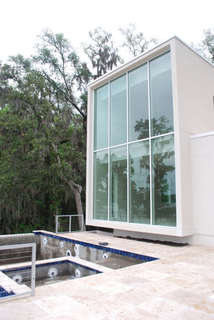 Riverfront Residence: A seamless blend of modern design and nature.