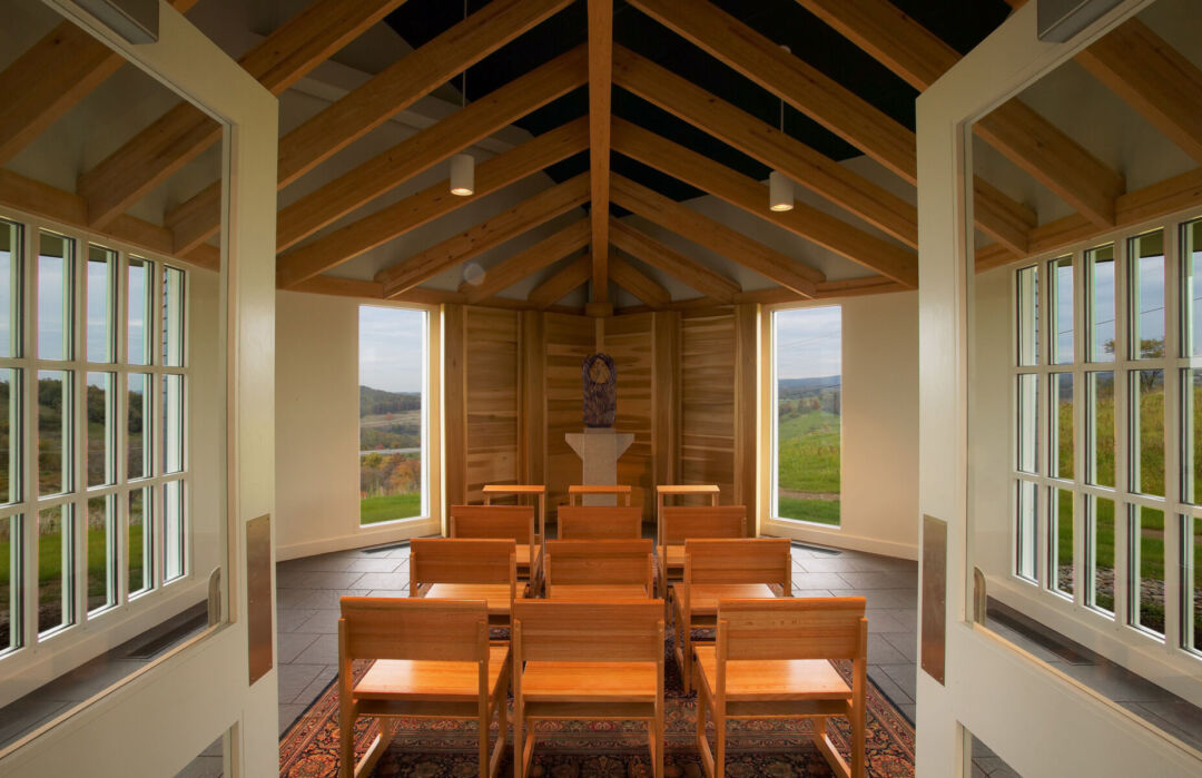 Modern church design blending tradition on a 55-acre farm.