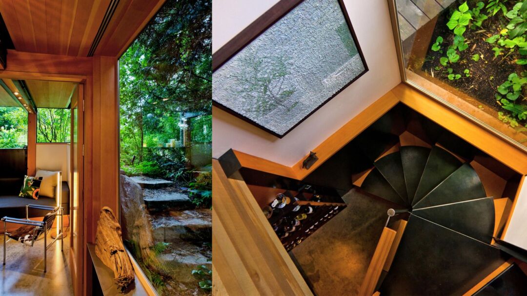 Large windows framing lush views at Phinney Residence.