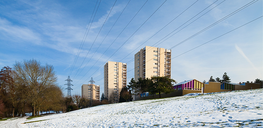 Architectural contrast with urban surroundings.