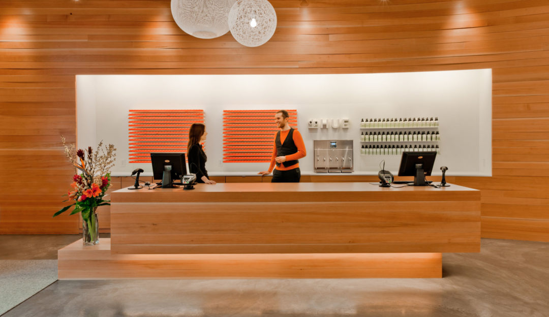 Signature curved wood wall enhancing the store