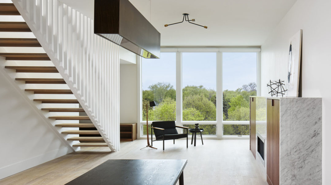 Architectural blend of modern aesthetics and traditional neighborhood charm. Architectural blend of modern aesthetics and traditional neighborhood charm.