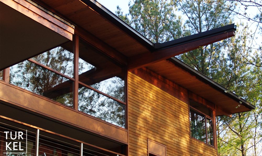 The butterfly roof channels rainwater to a retention pond. The butterfly roof channels rainwater to a retention pond.